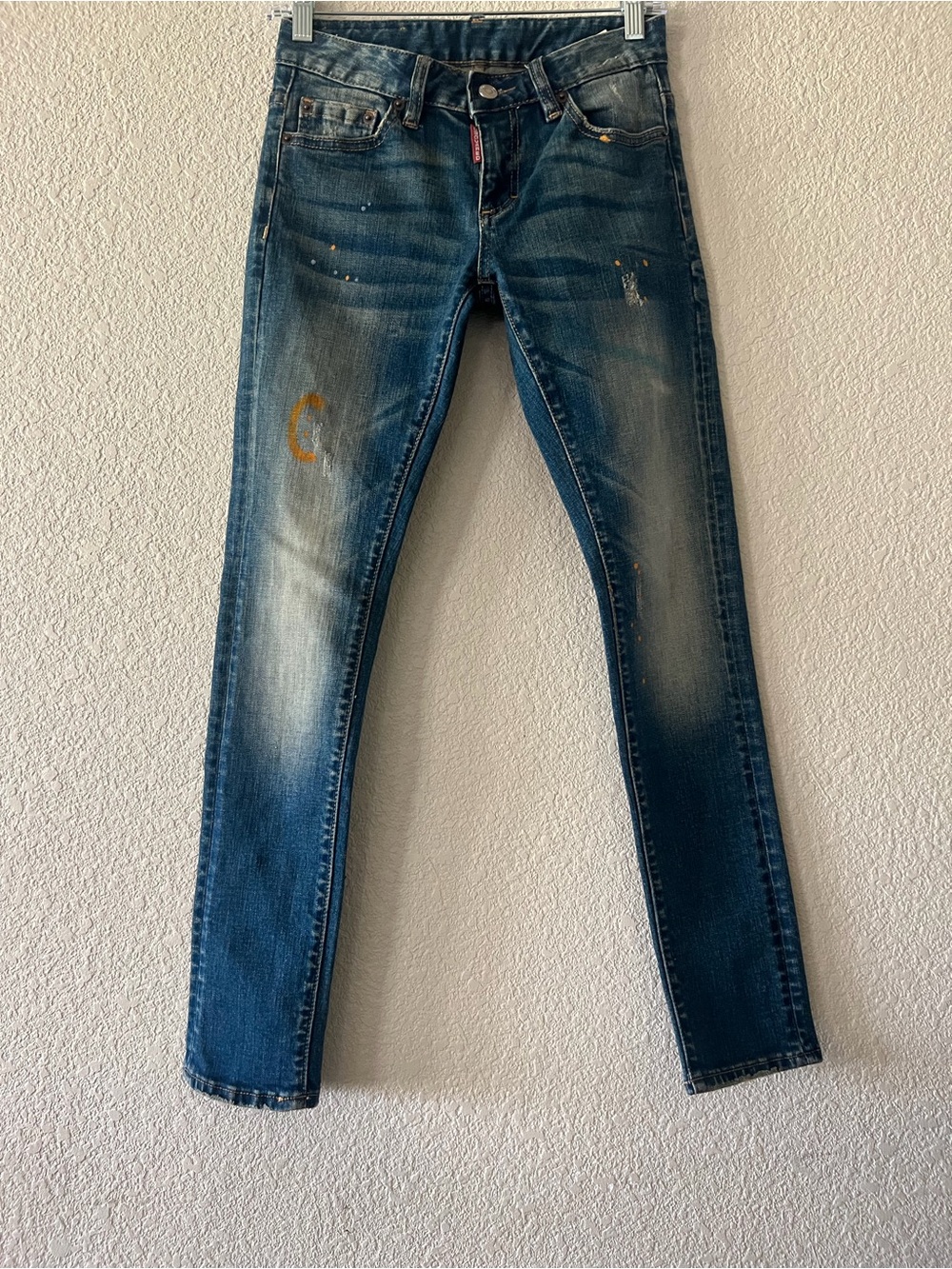DSQUARED Women's Skinny Jeans in Faded Blue with Subtle Paint Accents